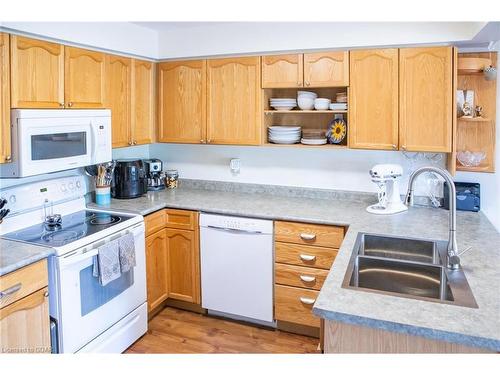 14-31 Schroder Crescent, Guelph, ON - Indoor Photo Showing Kitchen With Double Sink