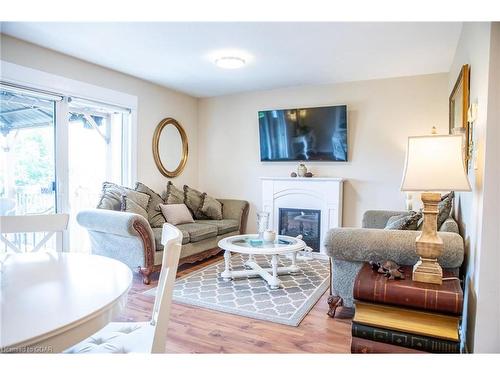 14-31 Schroder Crescent, Guelph, ON - Indoor Photo Showing Living Room With Fireplace