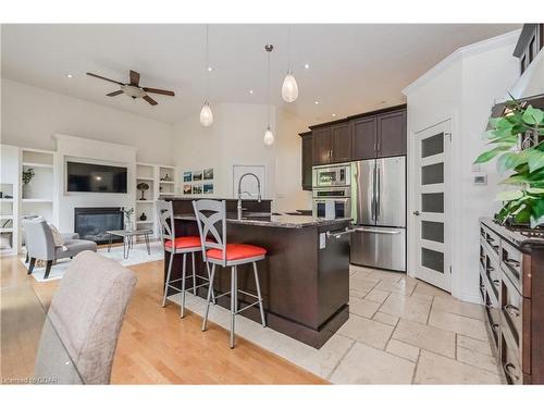 64 Water Street E, Elora, ON - Indoor Photo Showing Kitchen With Fireplace With Double Sink With Upgraded Kitchen