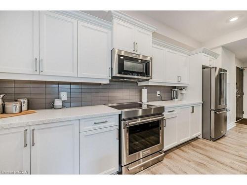 223-3290 New Street, Burlington, ON - Indoor Photo Showing Kitchen With Stainless Steel Kitchen