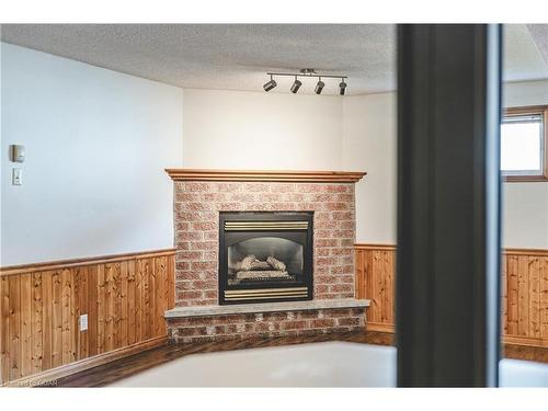 484 Millburn Boulevard, Fergus, ON - Indoor Photo Showing Living Room With Fireplace