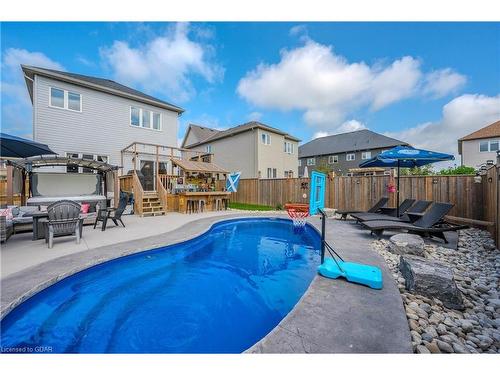 124 Courtney Street, Fergus, ON - Outdoor With In Ground Pool With Deck Patio Veranda With Backyard With Exterior