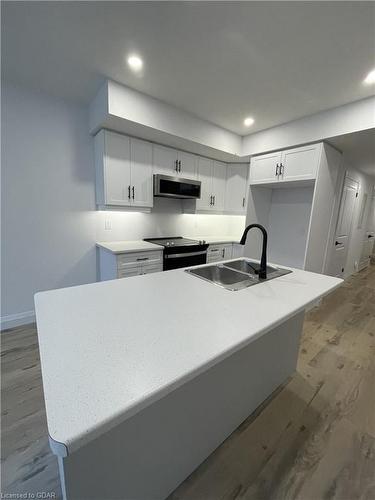 227 Schmidt Drive, Arthur, ON - Indoor Photo Showing Kitchen With Stainless Steel Kitchen With Double Sink With Upgraded Kitchen