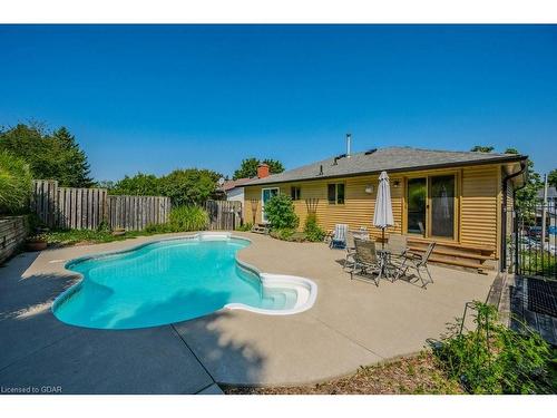 112 Freshmeadow Way, Guelph, ON - Outdoor With In Ground Pool With Deck Patio Veranda With Backyard