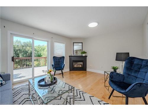 19 Silversmith Court, Guelph, ON - Indoor Photo Showing Living Room With Fireplace