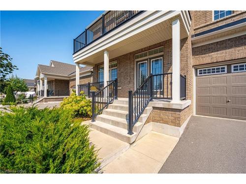 64 Harpin Way East, Fergus, ON - Outdoor With Deck Patio Veranda With Facade