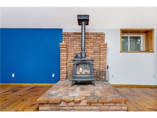 216 Barden Street, Eden Mills, ON - Indoor Photo Showing Living Room With Fireplace