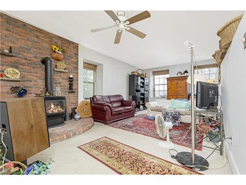 216 Barden Street, Eden Mills, ON - Indoor Photo Showing Living Room With Fireplace