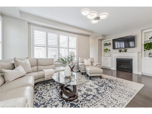 6-65 Elliott Ave East, Fergus, ON - Indoor Photo Showing Living Room With Fireplace