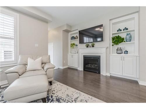 6-65 Elliott Ave East, Fergus, ON - Indoor Photo Showing Living Room With Fireplace