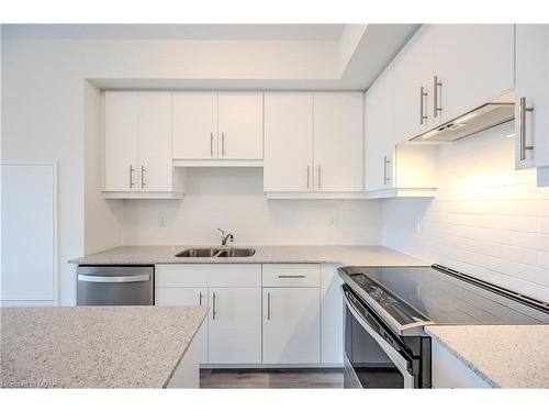 420-251 Northfield Drive East, Waterloo, ON - Indoor Photo Showing Kitchen With Double Sink