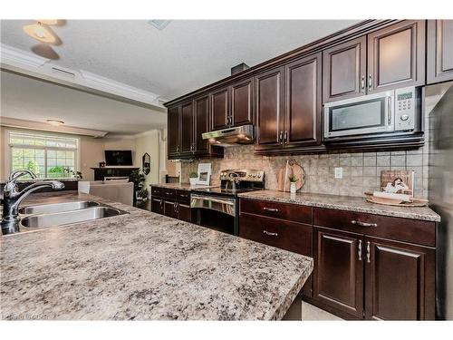 18-255 Summerfield Drive, Guelph, ON - Indoor Photo Showing Kitchen With Double Sink