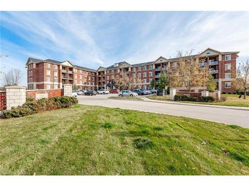 113-1440 Gordon Street, Guelph, ON - Outdoor With Balcony With Facade