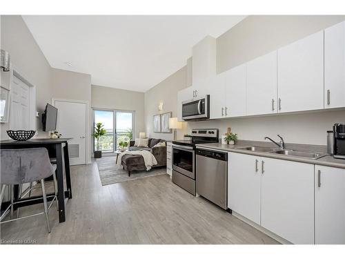 1109-716 Main Street East, Milton, ON - Indoor Photo Showing Kitchen With Double Sink