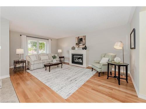 7 Beechlawn Boulevard, Guelph, ON - Indoor Photo Showing Living Room With Fireplace