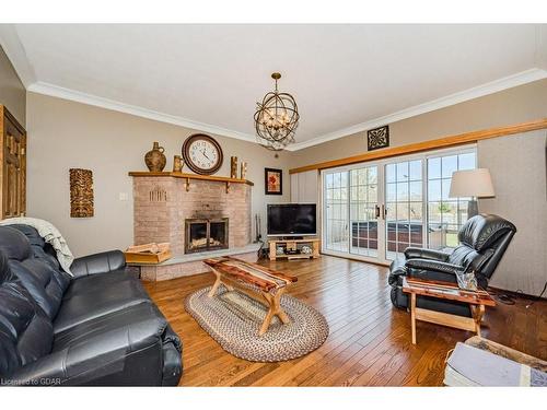 8108 Wellington Rd 22, Centre Wellington, ON - Indoor Photo Showing Living Room With Fireplace