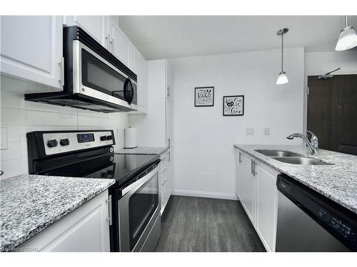 110-17 Kay Crescent, Guelph, ON - Indoor Photo Showing Kitchen With Stainless Steel Kitchen With Double Sink