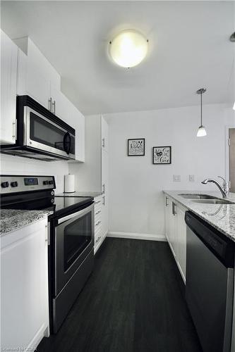 110-17 Kay Crescent, Guelph, ON - Indoor Photo Showing Kitchen With Stainless Steel Kitchen With Double Sink