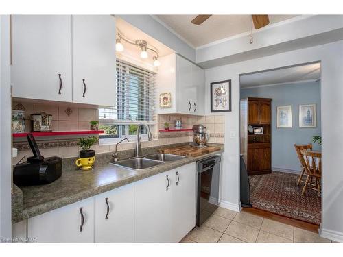 708-358 Waterloo Avenue, Guelph, ON - Indoor Photo Showing Kitchen With Double Sink