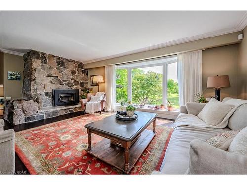 940 Watson Road S, Puslinch, ON - Indoor Photo Showing Living Room With Fireplace