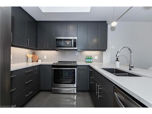 709-1878 Gordon Street, Guelph, ON - Indoor Photo Showing Kitchen With Stainless Steel Kitchen With Double Sink With Upgraded Kitchen