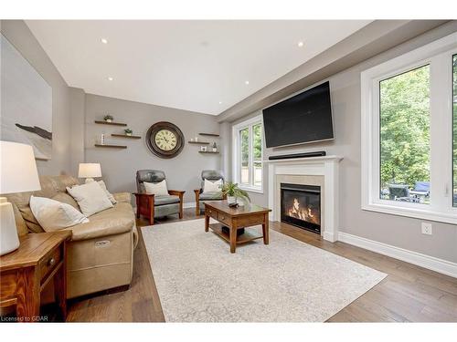 147 Upper Canada Court, Georgetown, ON - Indoor Photo Showing Living Room With Fireplace