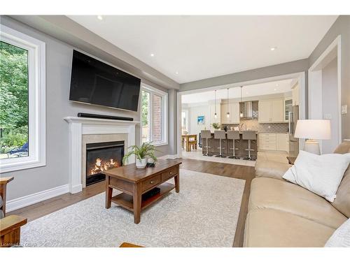 147 Upper Canada Court, Georgetown, ON - Indoor Photo Showing Living Room With Fireplace