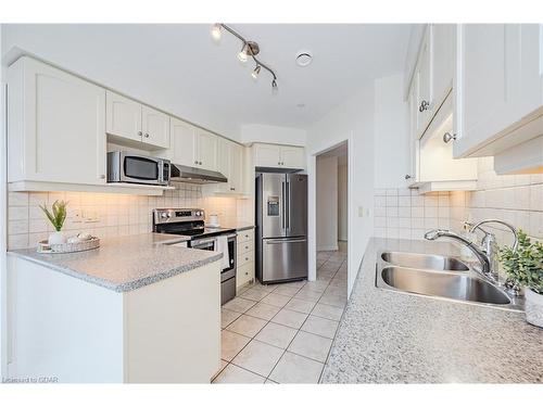 407-65 Bayberry Drive, Guelph, ON - Indoor Photo Showing Kitchen With Double Sink