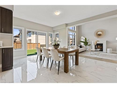 15 Venture Way, Thorold, ON - Indoor Photo Showing Dining Room With Fireplace