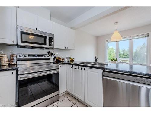 7-601 Columbia Forest Boulevard, Waterloo, ON - Indoor Photo Showing Kitchen With Double Sink