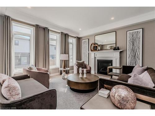 27 Spachman Street, Kitchener, ON - Indoor Photo Showing Living Room With Fireplace