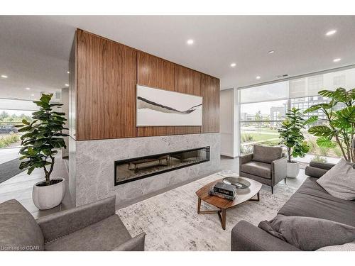 113-1880 Gordon Street, Guelph, ON - Indoor Photo Showing Living Room With Fireplace