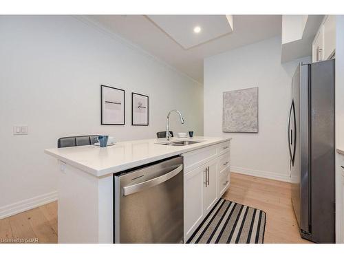 113-1880 Gordon Street, Guelph, ON - Indoor Photo Showing Kitchen With Double Sink