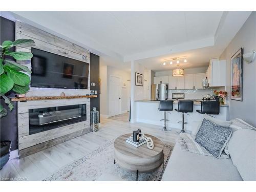 108-2 Colonial Drive, Guelph, ON - Indoor Photo Showing Living Room With Fireplace