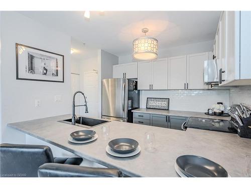 108-2 Colonial Drive, Guelph, ON - Indoor Photo Showing Kitchen With Stainless Steel Kitchen With Upgraded Kitchen