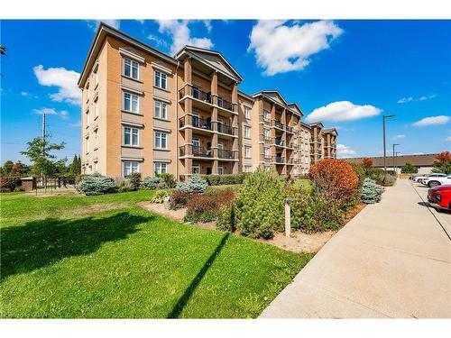 108-2 Colonial Drive, Guelph, ON - Outdoor With Balcony With Facade