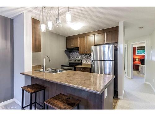 17-35 Mountford Drive Drive, Guelph, ON - Indoor Photo Showing Kitchen With Stainless Steel Kitchen With Double Sink