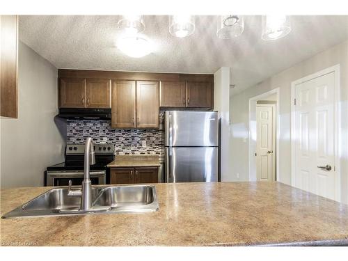 17-35 Mountford Drive Drive, Guelph, ON - Indoor Photo Showing Kitchen With Stainless Steel Kitchen With Double Sink