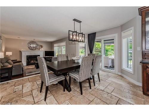 46 Cross Creek Boulevard, Guelph, ON - Indoor Photo Showing Dining Room With Fireplace