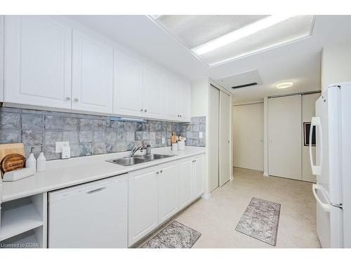 B2-105 Bagot St Street, Guelph, ON - Indoor Photo Showing Kitchen With Double Sink