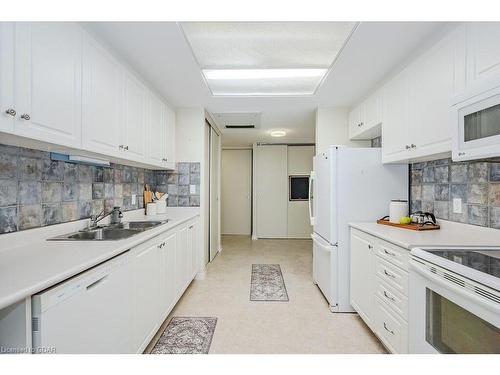 B2-105 Bagot St Street, Guelph, ON - Indoor Photo Showing Kitchen With Double Sink