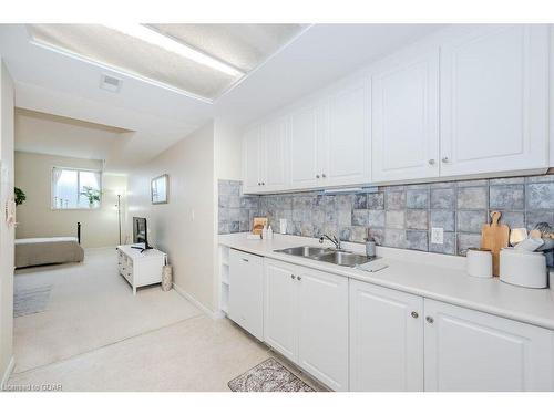 B2-105 Bagot St Street, Guelph, ON - Indoor Photo Showing Kitchen With Double Sink