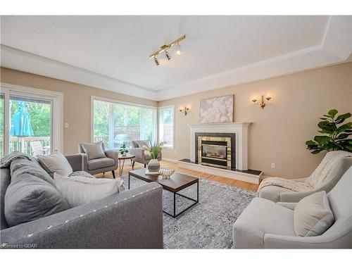 7 Whitetail Court, Guelph, ON - Indoor Photo Showing Living Room With Fireplace