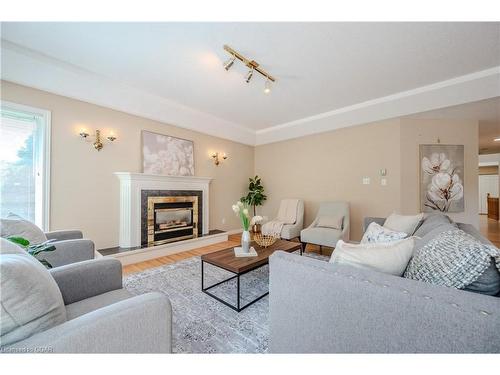 7 Whitetail Court, Guelph, ON - Indoor Photo Showing Living Room With Fireplace