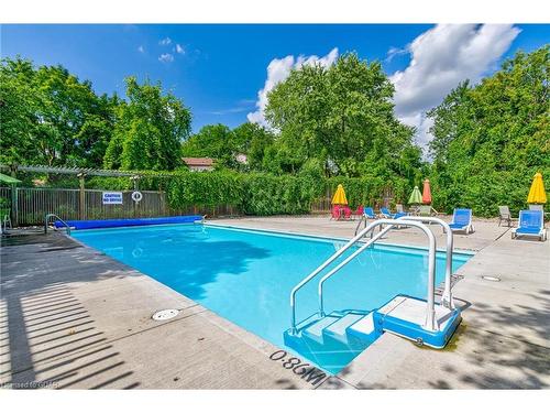 206-93 Westwood Road, Guelph, ON - Outdoor With In Ground Pool With Backyard