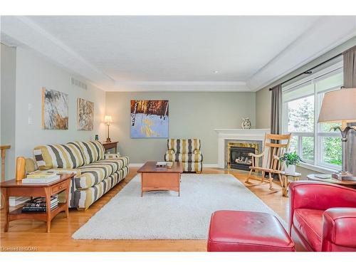 6 Sparling Court, Guelph, ON - Indoor Photo Showing Living Room With Fireplace