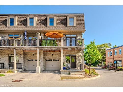 90 Cardigan Street, Guelph, ON - Outdoor With Balcony With Facade