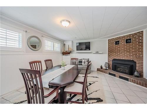 17 Ryan Avenue, Guelph, ON - Indoor Photo Showing Dining Room With Fireplace