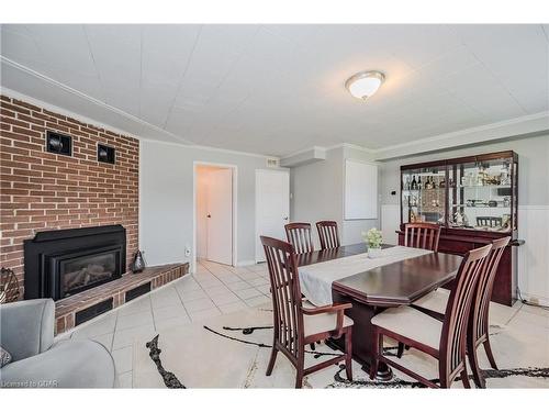 17 Ryan Avenue, Guelph, ON - Indoor Photo Showing Dining Room With Fireplace