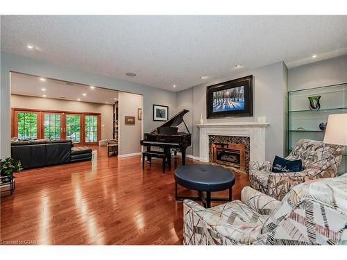 586 Eastgate Walk, Waterloo, ON - Indoor Photo Showing Living Room With Fireplace